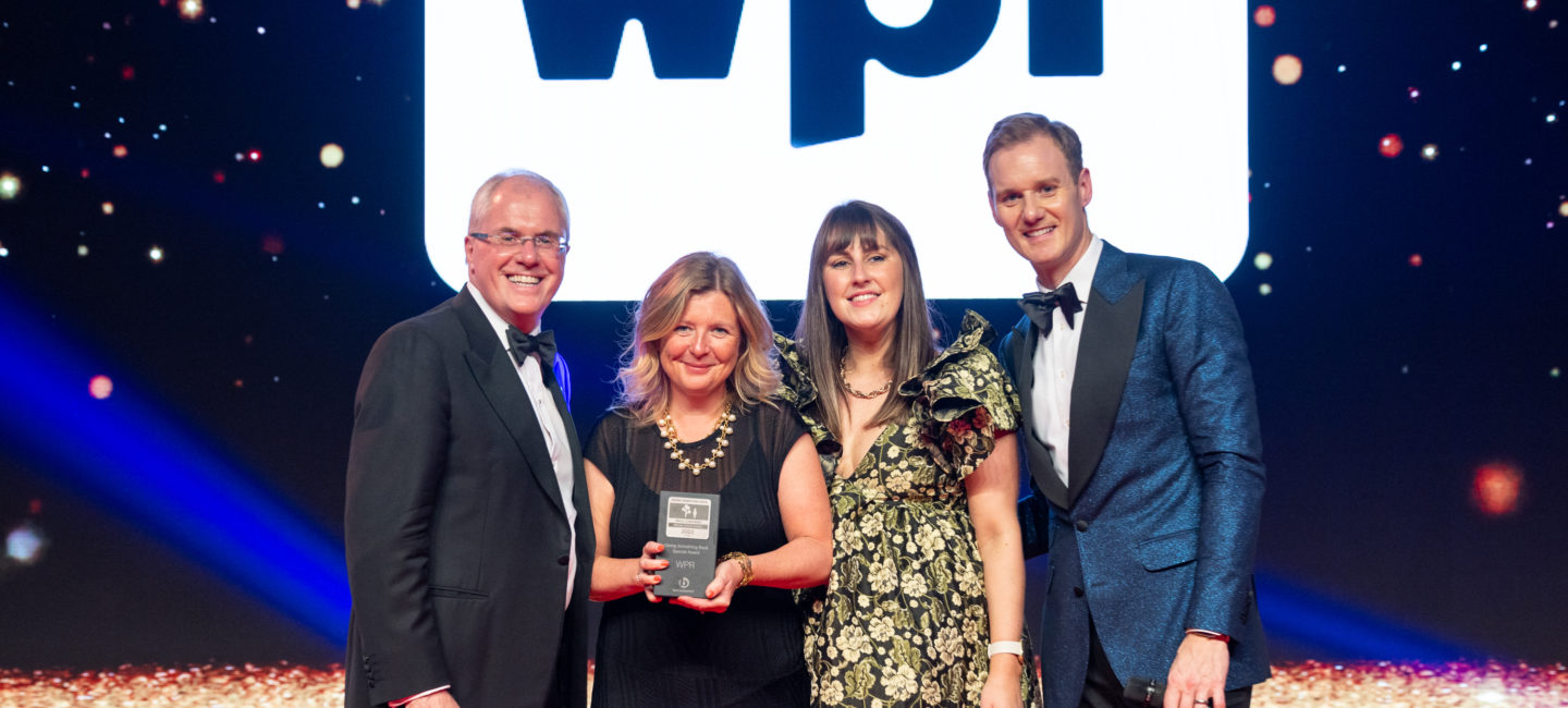 WPR team being presented with award at Best Companies 2022