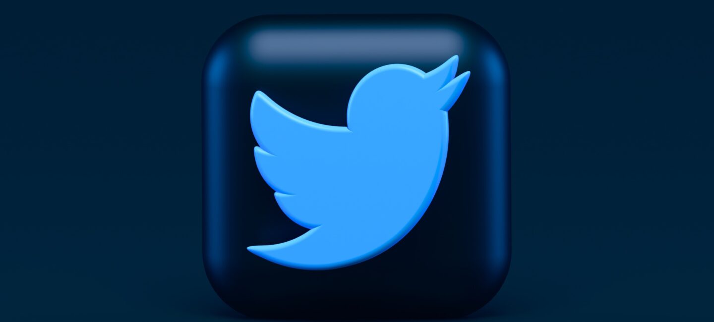 Twitter icon on dark blue background