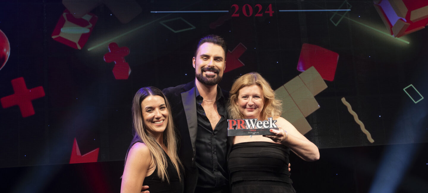 Rebecca Williams, Rylan and Jane Ainsworth holding the PR Week Best Agency Outside London trophy